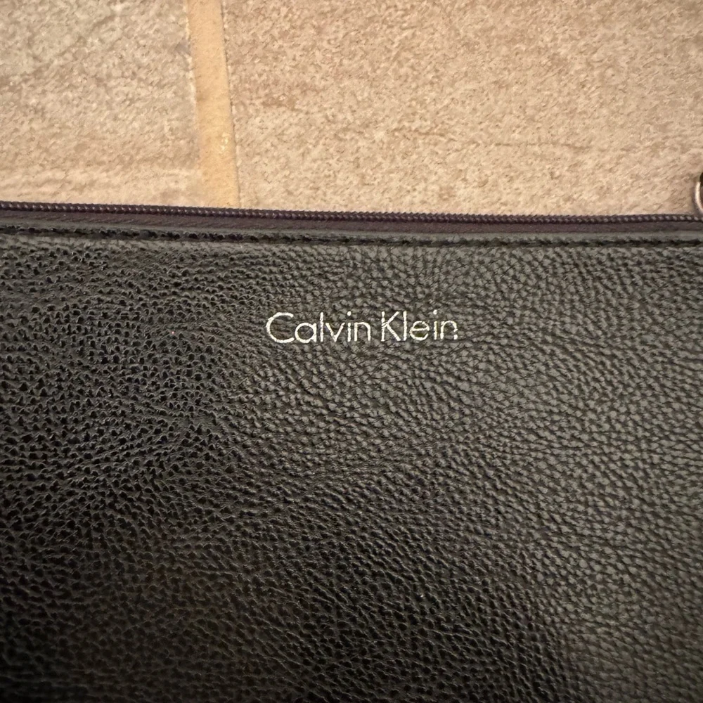 Calvin Klein Textured Black Wristlet
